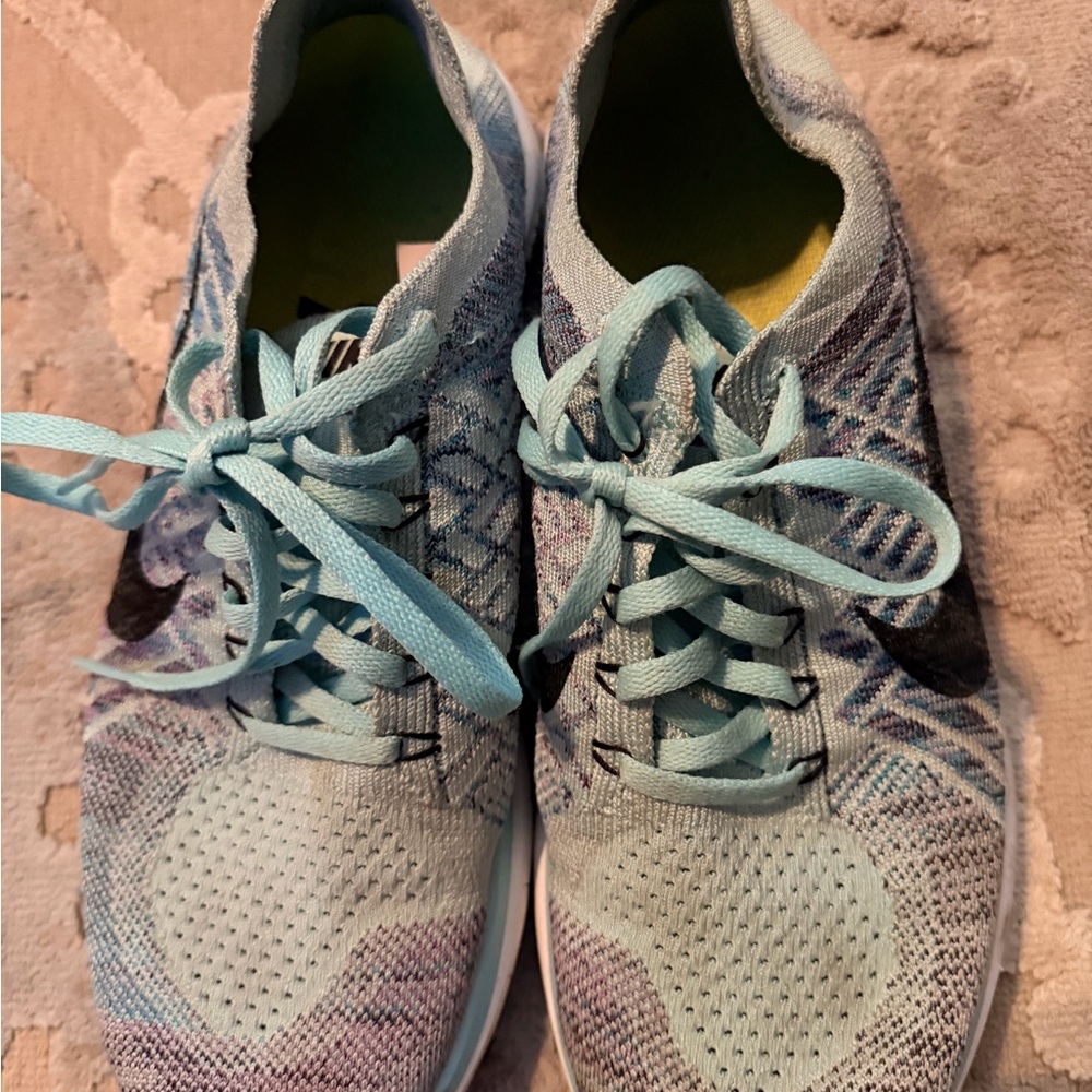 Nike Women’s Light Teal Flyknit Running Sneakers